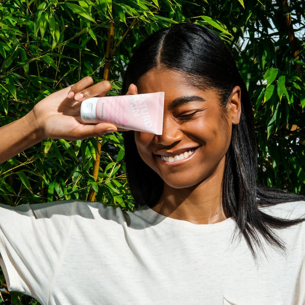 women holding product